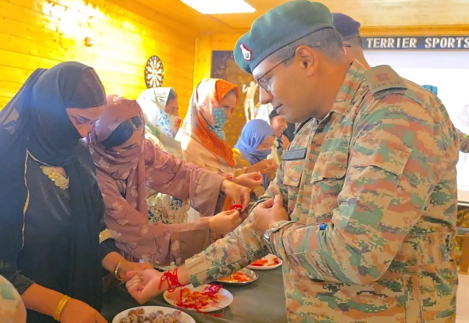 KUPWARA WOMEN CELEBRATE RAKSHABANDHAN WITH SOLDIERS AT PATAHIRRI GARRISSON

Local women from various villages tie "Rakhi